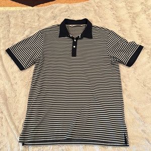 Medium Travis Mathew polo shirt.